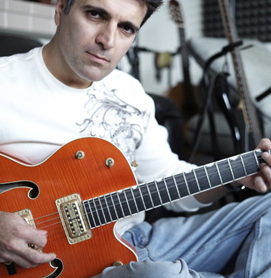 Michael Heart with Orange Gretsch Guitar